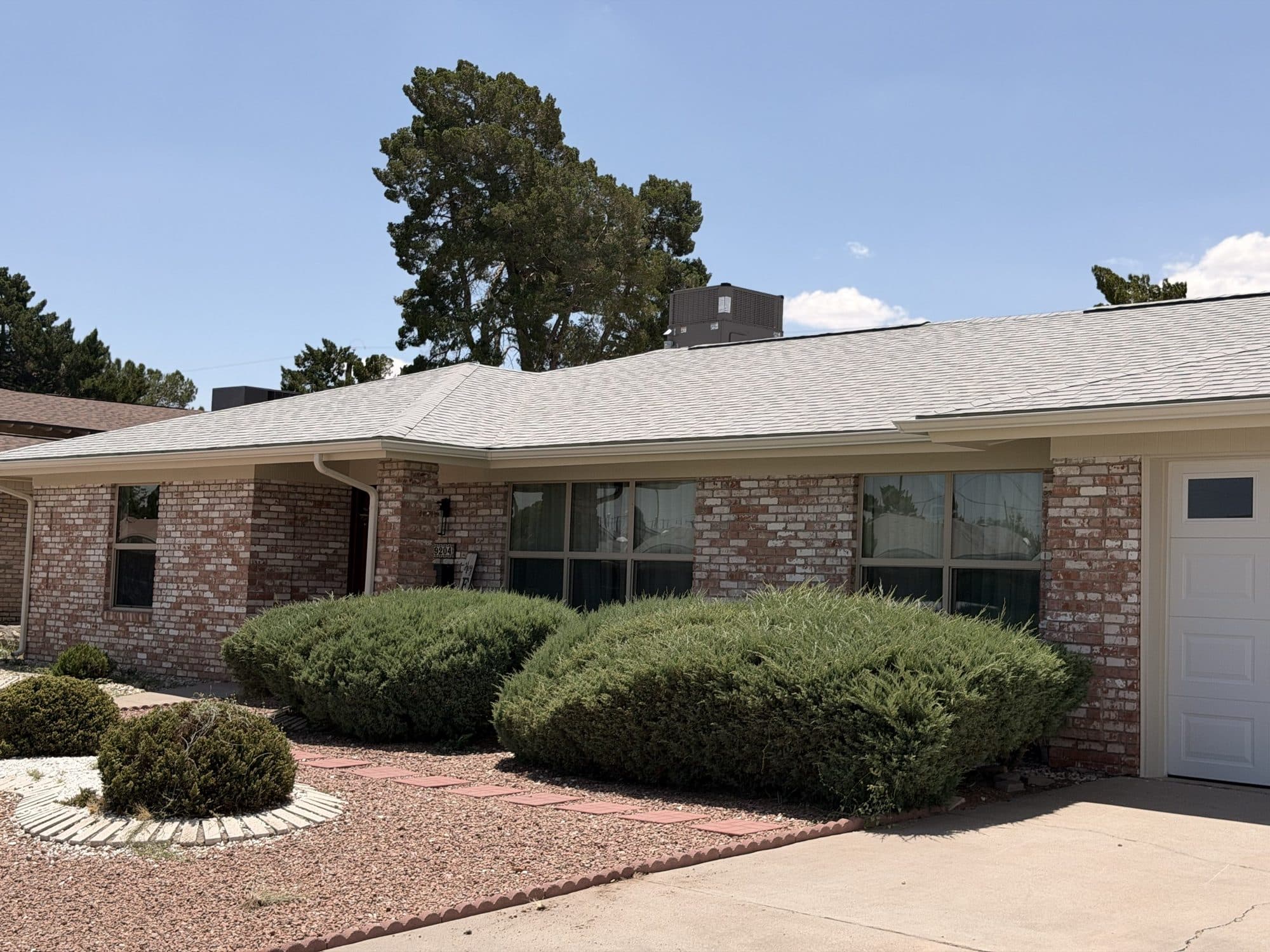 Front elevation of a finished brick ranch home